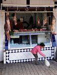 Visitors to a Marrakesh butcher