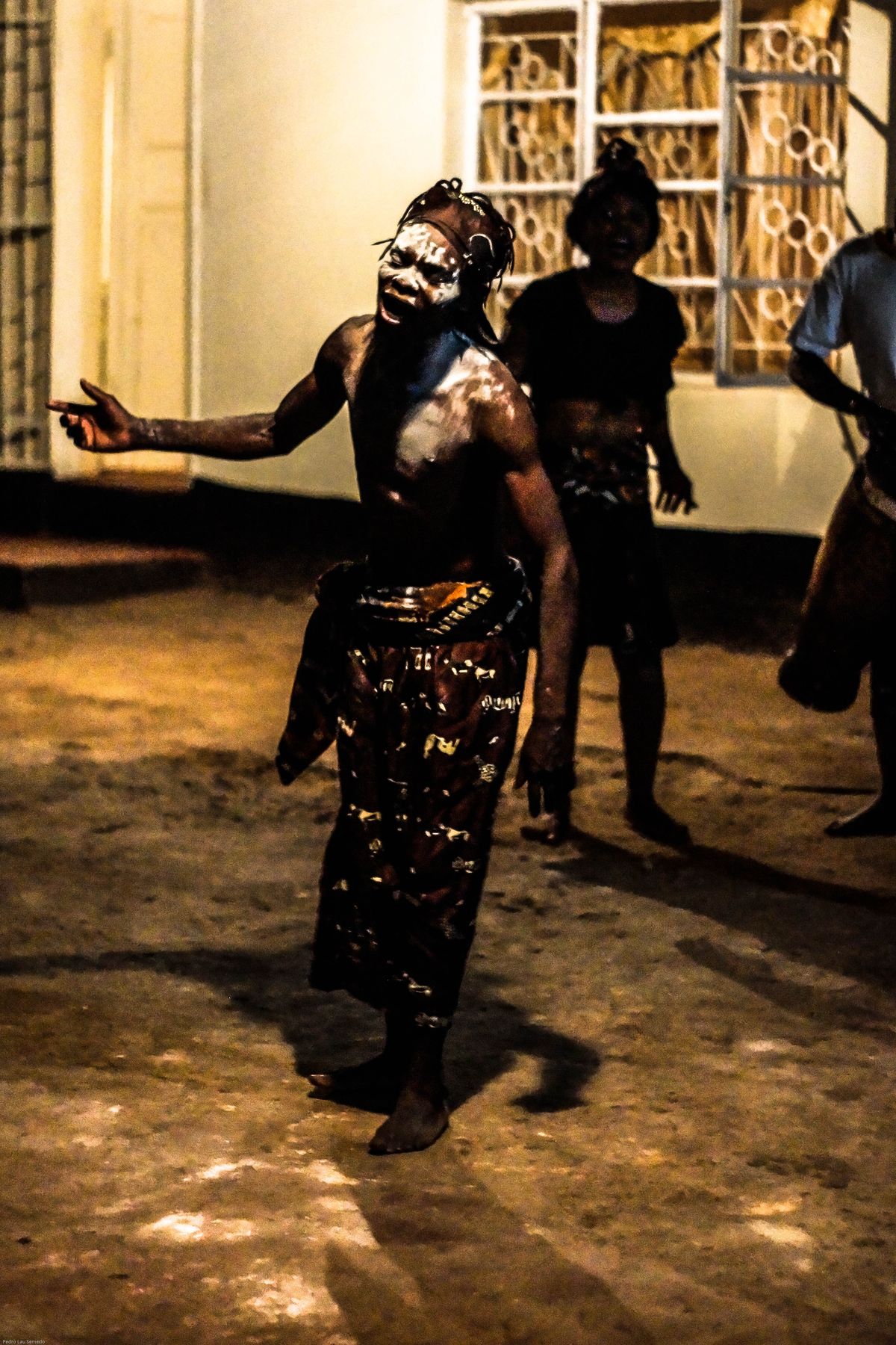 Young man performing a traditional dance in Botswana. Did not want to use a flash and did not have my tripod with me so it was quite a tricky shot.